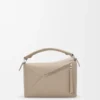 Bolso Puzzle Edge pequeño en piel de becerro de grano suave Bolso Puzzle Edge pequeño en piel de becerro de grano suave