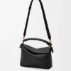 Bolso Puzzle Edge pequeño en piel de becerro de grano suave Bolso Puzzle Edge pequeño en piel de becerro de grano suave