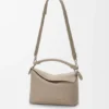 Bolso Puzzle Edge pequeño en piel de becerro de grano suave Bolso Puzzle Edge pequeño en piel de becerro de grano suave