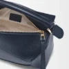 Bolso Puzzle Edge pequeño en piel de becerro de grano suave Bolso Puzzle Edge pequeño en piel de becerro de grano suave