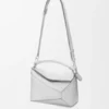Bolso Puzzle Edge pequeño en piel de cordero laminada Bolso Puzzle Edge pequeño en piel de cordero laminada