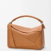 Bolso Puzzle grande en piel de becerro granulada y flexible Bolso Puzzle grande en piel de becerro granulada y flexible