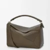 Bolso Puzzle grande en piel de becerro granulada y flexible Bolso Puzzle grande en piel de becerro granulada y flexible