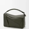Bolso Puzzle grande en piel de becerro granulada y flexible Bolso Puzzle grande en piel de becerro granulada y flexible