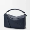 Bolso Puzzle grande en piel de becerro granulada y flexible Bolso Puzzle grande en piel de becerro granulada y flexible