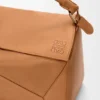 Bolso Puzzle grande en piel de becerro granulada y flexible Bolso Puzzle grande en piel de becerro granulada y flexible