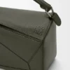 Bolso Puzzle grande en piel de becerro granulada y flexible Bolso Puzzle grande en piel de becerro granulada y flexible