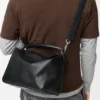 Bolso Puzzle grande en piel de becerro granulada y flexible Bolso Puzzle grande en piel de becerro granulada y flexible