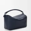 Bolso Puzzle grande en piel de becerro granulada y flexible Bolso Puzzle grande en piel de becerro granulada y flexible