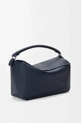 Bolso Puzzle grande en piel de becerro granulada y flexible