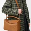 Bolso Puzzle grande en piel de becerro granulada y flexible Bolso Puzzle grande en piel de becerro granulada y flexible