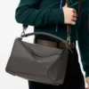 Bolso Puzzle grande en piel de becerro granulada y flexible Bolso Puzzle grande en piel de becerro granulada y flexible