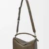 Bolso Puzzle grande en piel de becerro granulada y flexible Bolso Puzzle grande en piel de becerro granulada y flexible