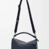 Bolso Puzzle grande en piel de becerro granulada y flexible Bolso Puzzle grande en piel de becerro granulada y flexible