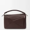 Bolso Puzzle grande en piel de becerro granulada y flexible Bolso Puzzle grande en piel de becerro granulada y flexible