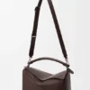 Bolso Puzzle grande en piel de becerro granulada y flexible Bolso Puzzle grande en piel de becerro granulada y flexible