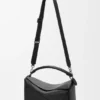 Bolso Puzzle grande en piel de becerro granulada y flexible Bolso Puzzle grande en piel de becerro granulada y flexible