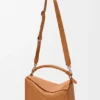 Bolso Puzzle grande en piel de becerro granulada y flexible Bolso Puzzle grande en piel de becerro granulada y flexible