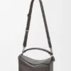 Bolso Puzzle grande en piel de becerro granulada y flexible Bolso Puzzle grande en piel de becerro granulada y flexible