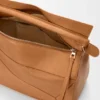 Bolso Puzzle grande en piel de becerro granulada y flexible Bolso Puzzle grande en piel de becerro granulada y flexible