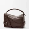 Bolso Puzzle grande estilo motero en piel de becerro brillante Bolso Puzzle grande estilo motero en piel de becerro brillante