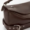 Bolso Puzzle grande estilo motero en piel de becerro brillante Bolso Puzzle grande estilo motero en piel de becerro brillante