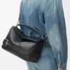 Bolso Puzzle grande estilo motero en piel de becerro brillante Bolso Puzzle grande estilo motero en piel de becerro brillante