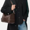 Bolso Puzzle grande estilo motero en piel de becerro brillante Bolso Puzzle grande estilo motero en piel de becerro brillante