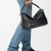 Bolso Puzzle grande estilo motero en piel de becerro brillante Bolso Puzzle grande estilo motero en piel de becerro brillante