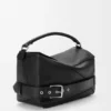 Bolso Puzzle grande estilo motero en piel de becerro brillante Bolso Puzzle grande estilo motero en piel de becerro brillante