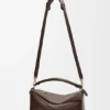 Bolso Puzzle grande estilo motero en piel de becerro brillante Bolso Puzzle grande estilo motero en piel de becerro brillante