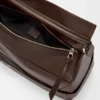 Bolso Puzzle grande estilo motero en piel de becerro brillante Bolso Puzzle grande estilo motero en piel de becerro brillante