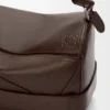 Bolso Puzzle grande estilo motero en piel de becerro brillante Bolso Puzzle grande estilo motero en piel de becerro brillante
