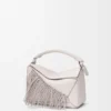 Bolso Puzzle pequeño con flecos en piel de becerro clásica Bolso Puzzle pequeño con flecos en piel de becerro clásica