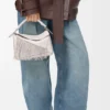 Bolso Puzzle pequeño con flecos en piel de becerro clásica Bolso Puzzle pequeño con flecos en piel de becerro clásica