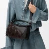 Bolso Puzzle pequeño con flecos en piel de becerro clásica Bolso Puzzle pequeño con flecos en piel de becerro clásica