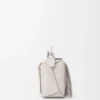 Bolso Puzzle pequeño con flecos en piel de becerro clásica Bolso Puzzle pequeño con flecos en piel de becerro clásica