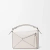 Bolso Puzzle pequeño con flecos en piel de becerro clásica Bolso Puzzle pequeño con flecos en piel de becerro clásica