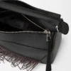 Bolso Puzzle pequeño con flecos en piel de becerro clásica Bolso Puzzle pequeño con flecos en piel de becerro clásica