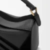 Bolso Puzzle pequeño en piel de becerro clásica y gamuza Bolso Puzzle pequeño en piel de becerro clásica y gamuza