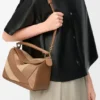 Bolso Puzzle pequeño en piel de becerro clásica y gamuza Bolso Puzzle pequeño en piel de becerro clásica y gamuza