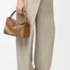 Bolso Puzzle pequeño en piel de becerro clásica y gamuza Bolso Puzzle pequeño en piel de becerro clásica y gamuza