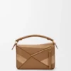 Bolso Puzzle pequeño en piel de becerro clásica y gamuza Bolso Puzzle pequeño en piel de becerro clásica y gamuza