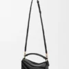 Bolso Puzzle pequeño en piel de becerro clásica y gamuza Bolso Puzzle pequeño en piel de becerro clásica y gamuza