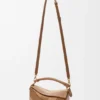 Bolso Puzzle pequeño en piel de becerro clásica y gamuza Bolso Puzzle pequeño en piel de becerro clásica y gamuza