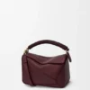 Bolso Puzzle pequeño en piel de becerro lisa y piel de cordero napa Bolso Puzzle pequeño en piel de becerro lisa y piel de cordero napa