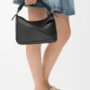 Bolso Puzzle pequeño en piel de becerro lisa y piel de cordero napa Bolso Puzzle pequeño en piel de becerro lisa y piel de cordero napa
