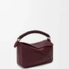 Bolso Puzzle pequeño en piel de becerro lisa y piel de cordero napa Bolso Puzzle pequeño en piel de becerro lisa y piel de cordero napa