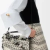 Bolso Puzzle pequeño en tejido trenzado Bolso Puzzle pequeño en tejido trenzado