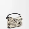 Bolso Puzzle pequeño en tejido trenzado Bolso Puzzle pequeño en tejido trenzado